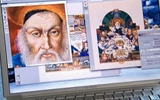 Reviewing Digital Photos of Original Haggadah Artwork.